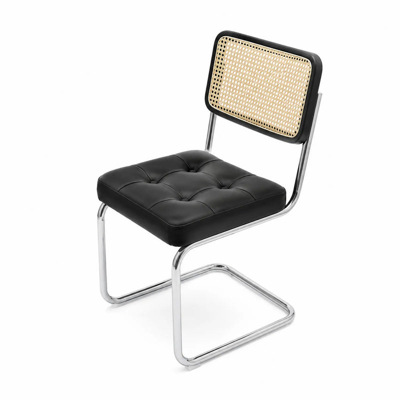 Chaise en cuir synthétique noir avec dossier en rotin et cadre en acier chromé